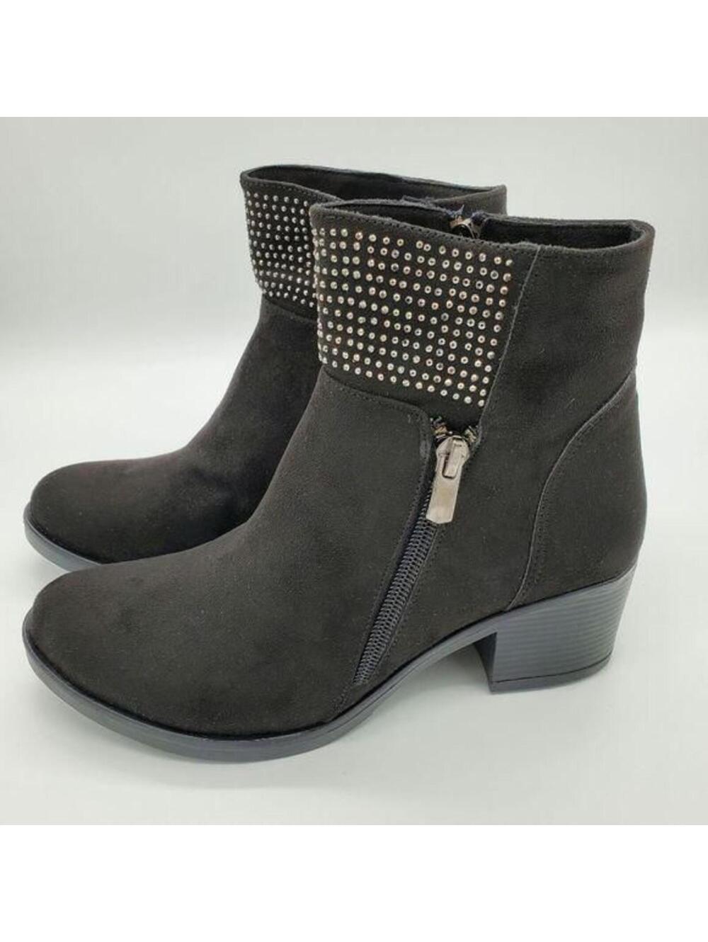 Black boots with stones